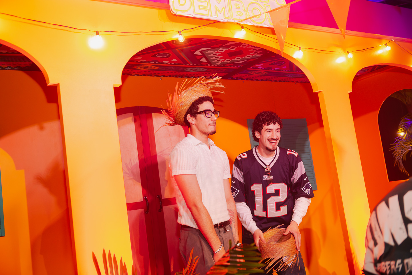 MCs on La Casita stage with arches and lights