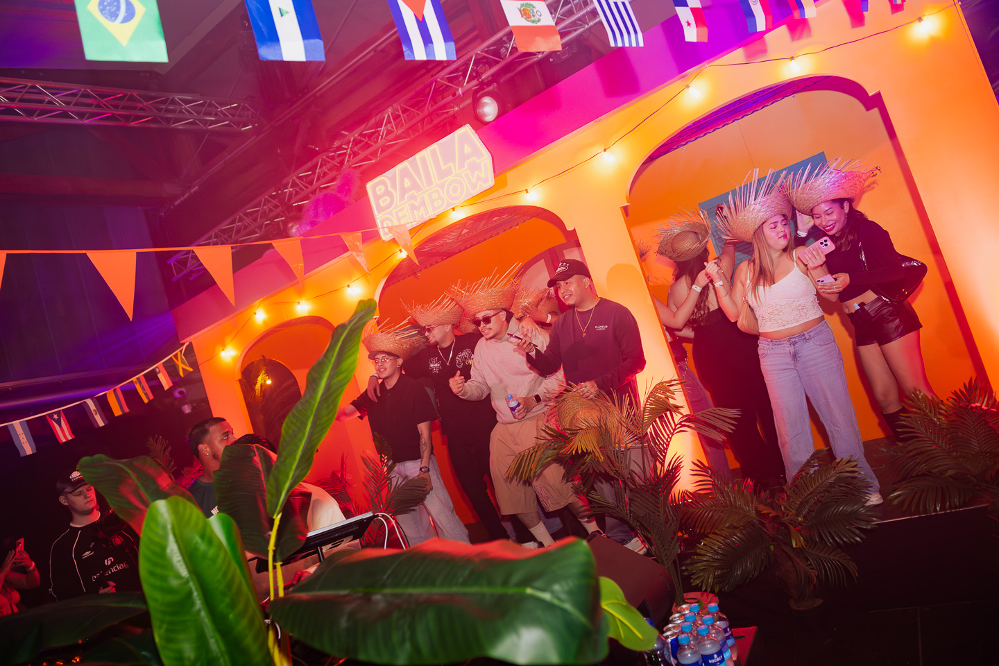 La Casita stage with crowd and straw hats